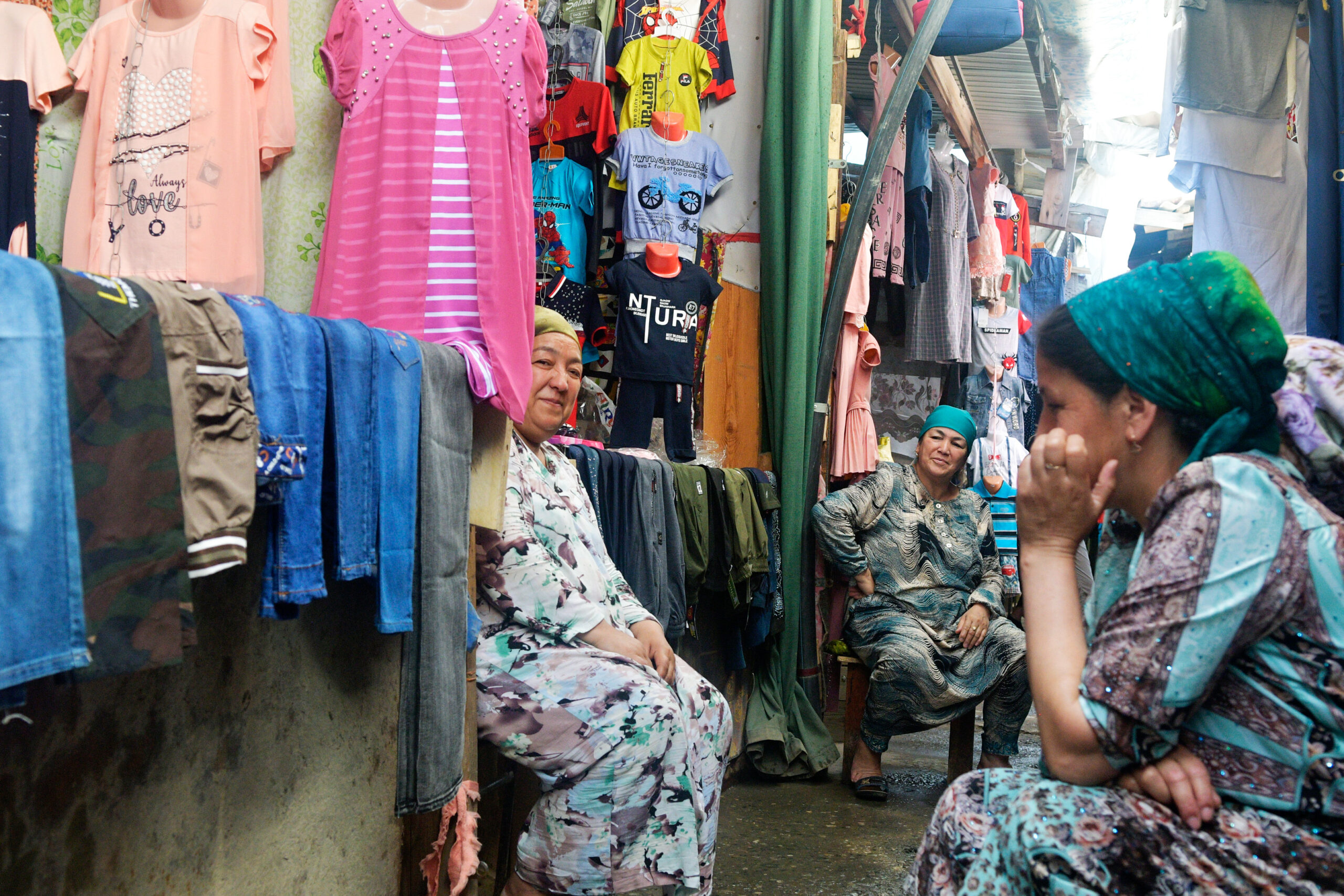 Sellers of women’s clothing in Panjakent are having a conversation with each other, Tajikistan…The Central Asia Regional Economic Cooperation Corridor 6 (Ayni-Uzbekistan Border Road) Improvement Project will restore approximately 113 kilometers of road between Ayni-Panjakent in the northern part of the country and its border with Uzbekistan.