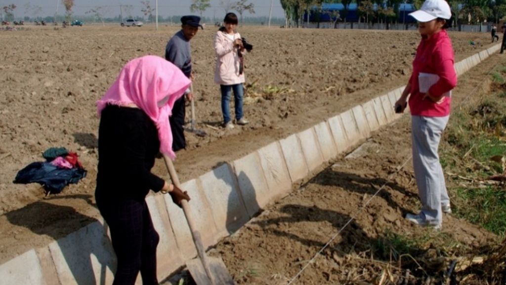 Women at work on the project's irrigation engineering site.